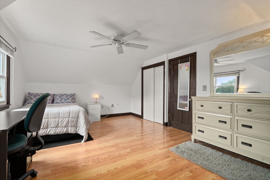 9 Laurel Lane Bellingham, MA 02019 - Photo 28 of 30 a spacious bedroom with a bed and a dresser