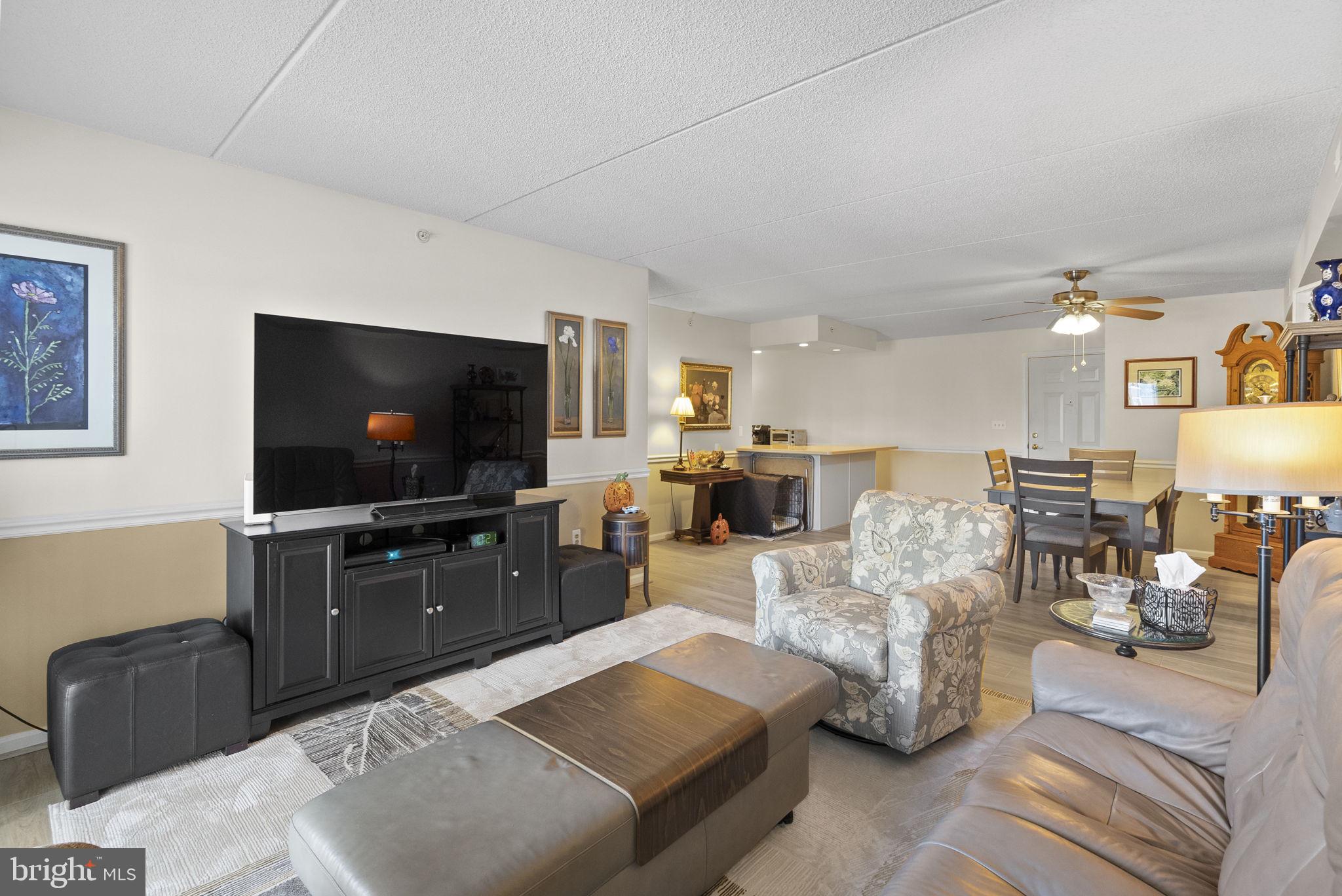 533 Brandon Road Eagleville, PA 19403 - Photo 11 of 32 a living room with furniture and a flat screen tv