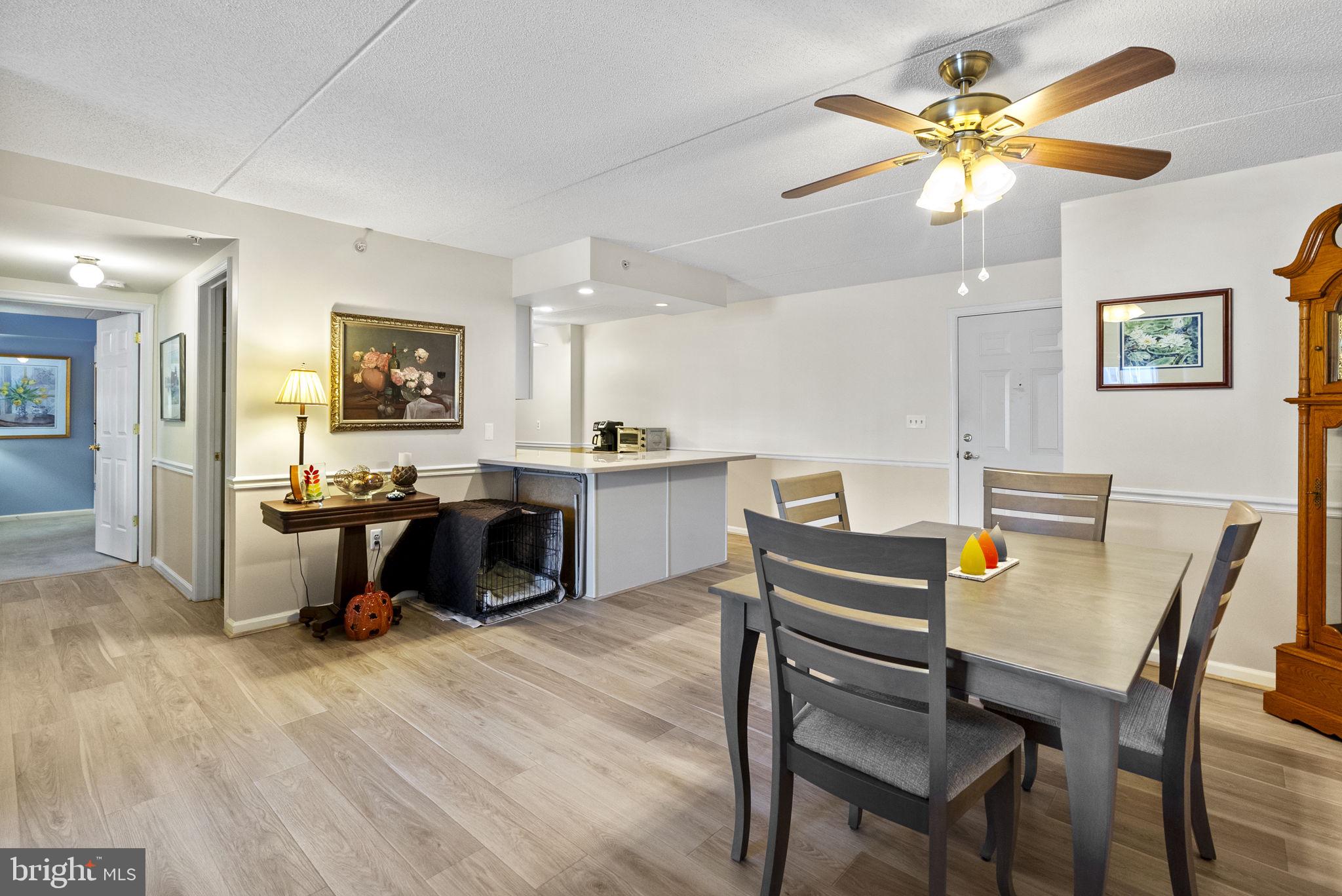 533 Brandon Road Eagleville, PA 19403 - Photo 12 of 32 a kitchen with a table chairs and a refrigerator