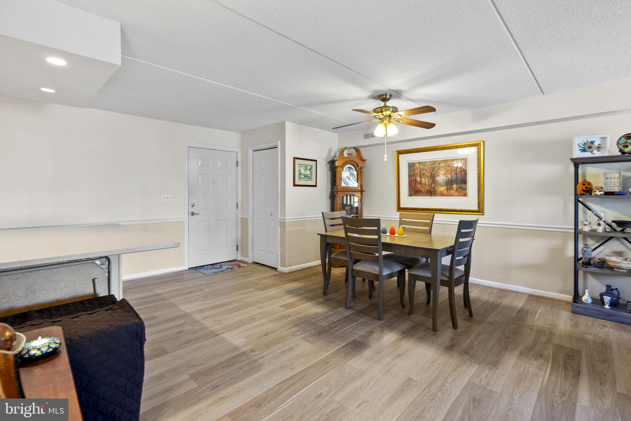 533 Brandon Road Eagleville, PA 19403 - Photo 13 of 32 a view of a dining room with furniture and chandelier