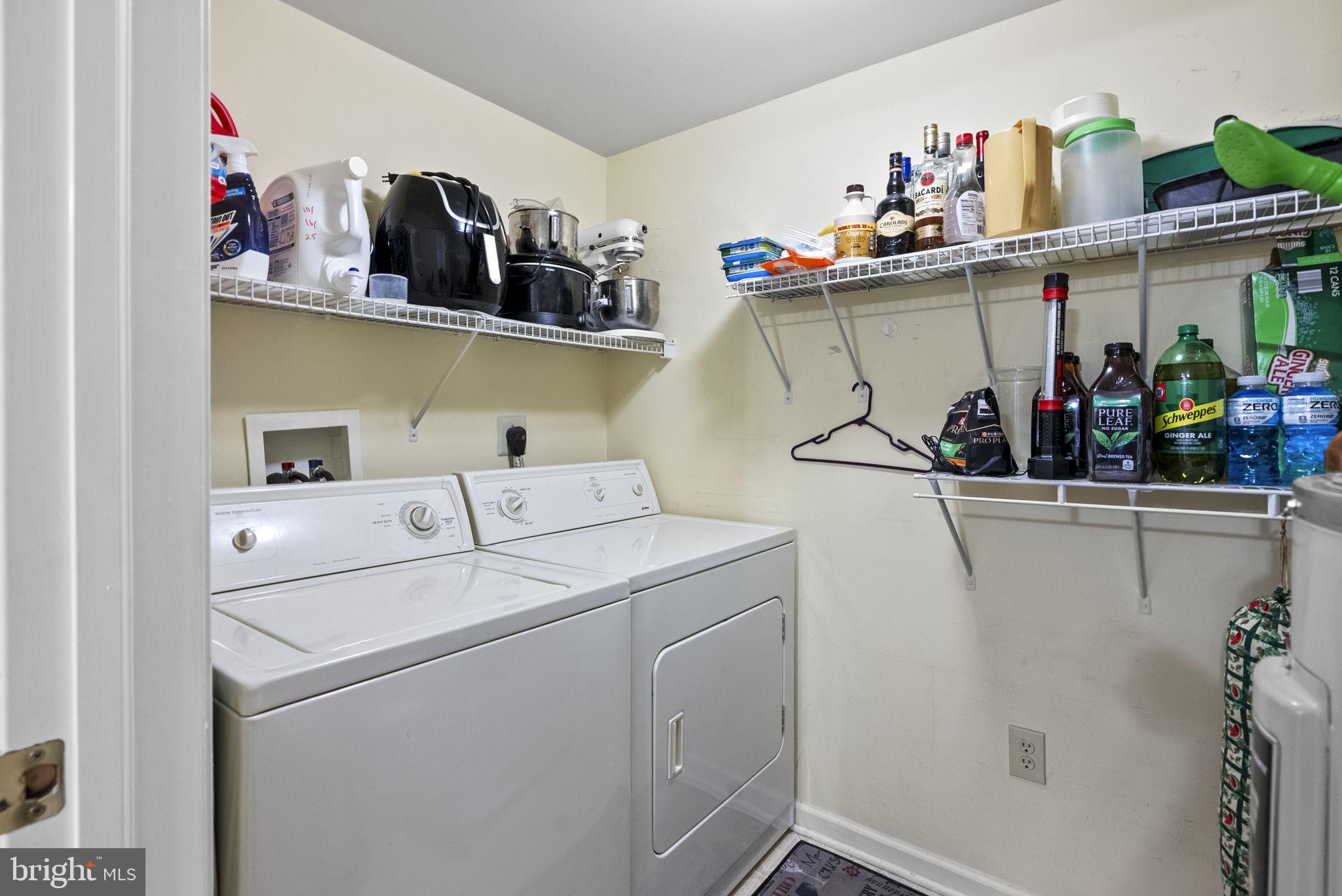 533 Brandon Road Eagleville, PA 19403 - Photo 22 of 32 a view of storage and utility room with washer and dryer