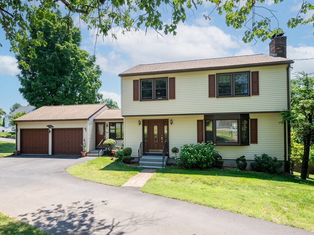 297 Granby Road Chicopee, MA 01013 - Photo 1 of 40 a view of house with outdoor space and porch