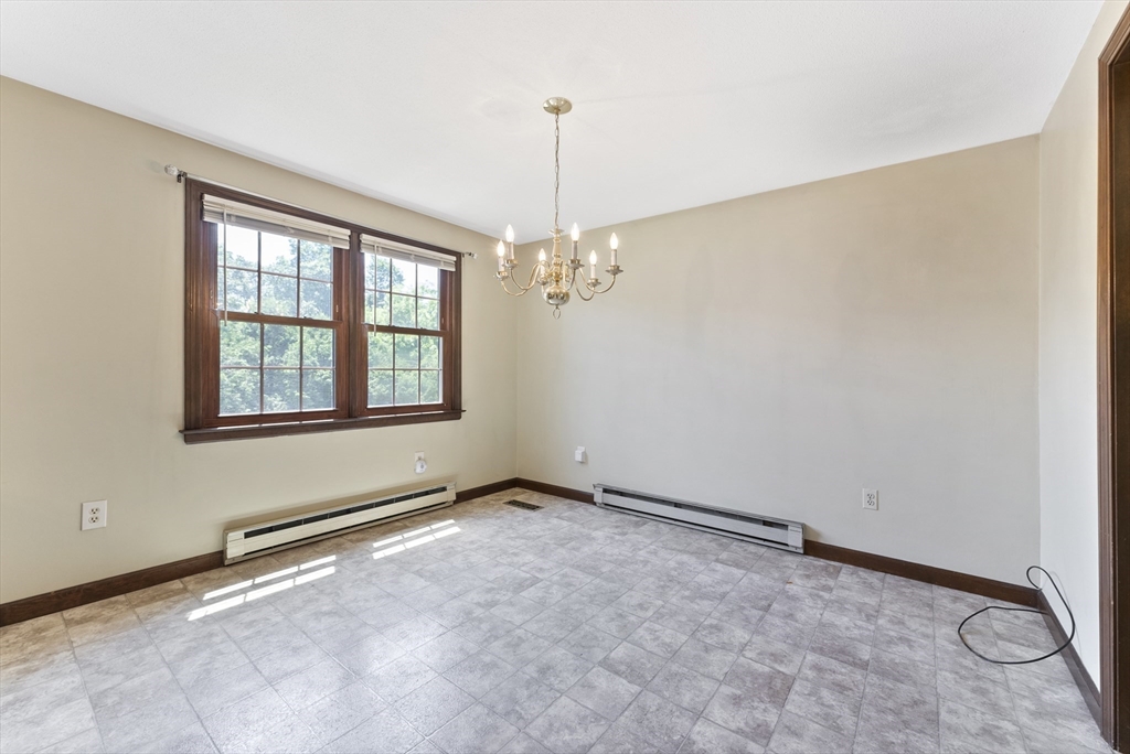 297 Granby Road Chicopee, MA 01013 - Photo 15 of 40 a view of an empty room with a window