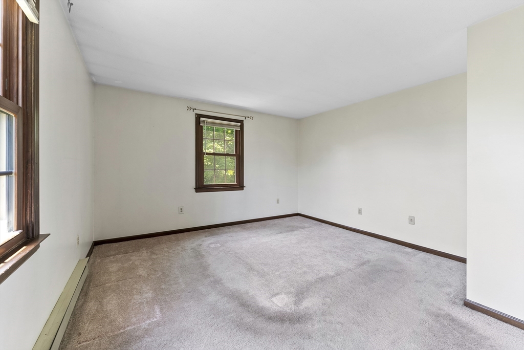 297 Granby Road Chicopee, MA 01013 - Photo 23 of 40 an empty room with windows