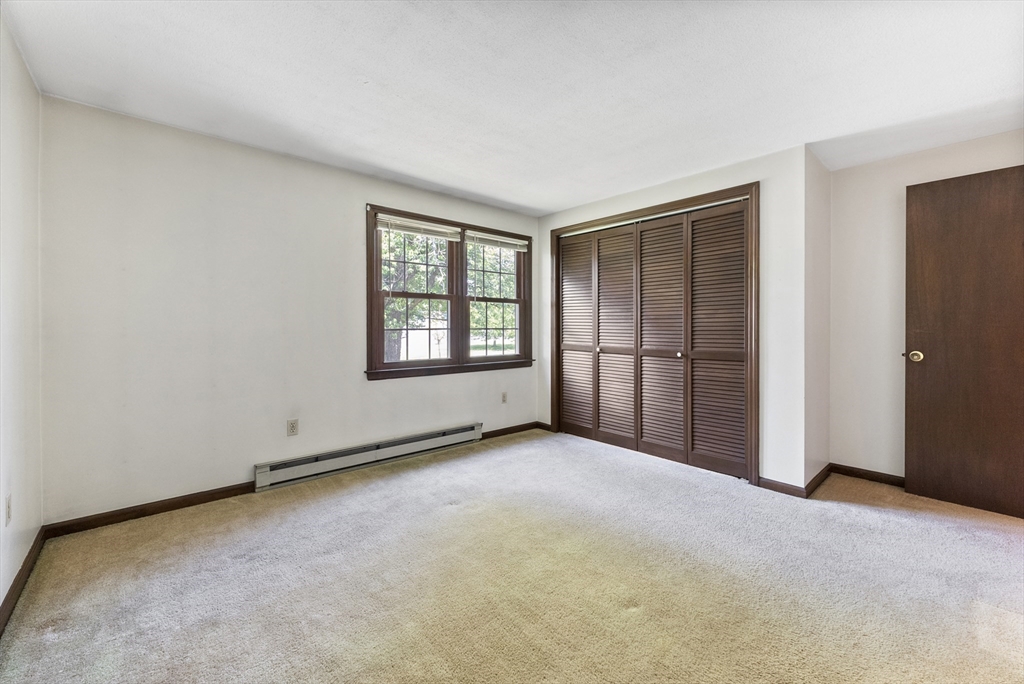 297 Granby Road Chicopee, MA 01013 - Photo 27 of 40 an empty room with windows