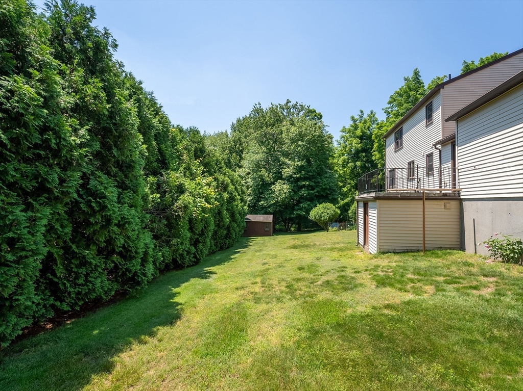 297 Granby Road Chicopee, MA 01013 - Photo 32 of 40 a view of a house with backyard and garden