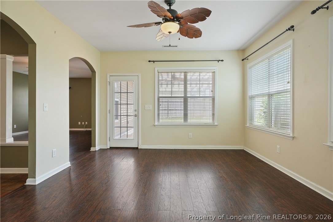 415 Highgrove Drive Spring Lake, NC 28390 - Photo 15 of 39 a view of an empty room with wooden floor and a window