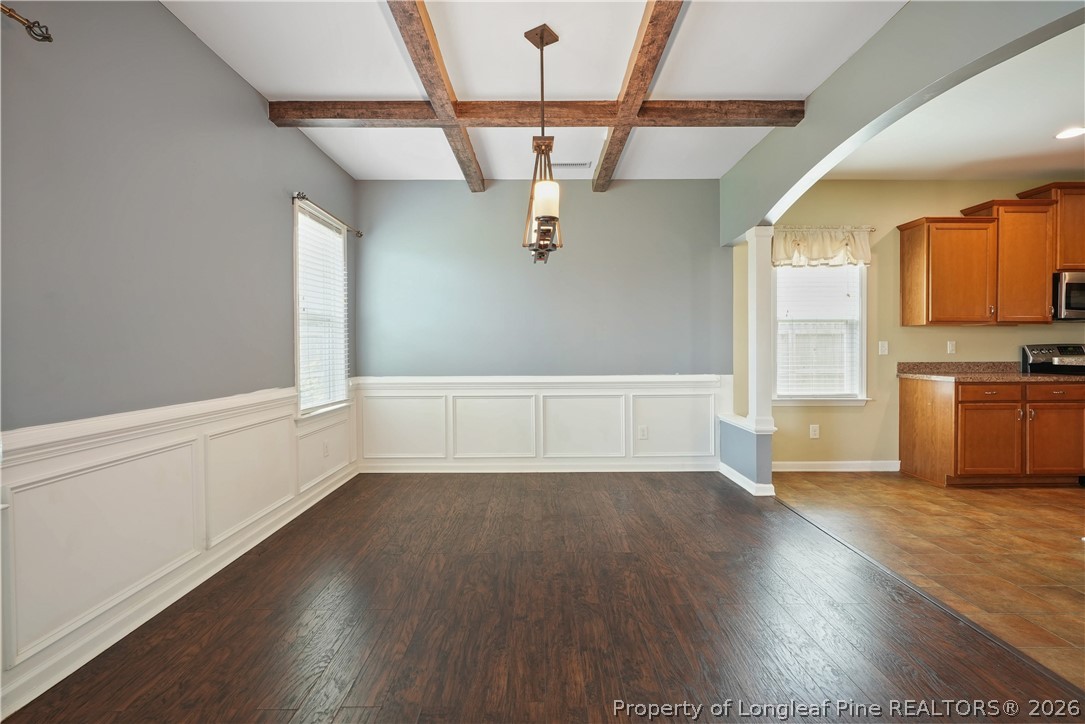 415 Highgrove Drive Spring Lake, NC 28390 - Photo 16 of 39 a view of empty room with wooden floor and window