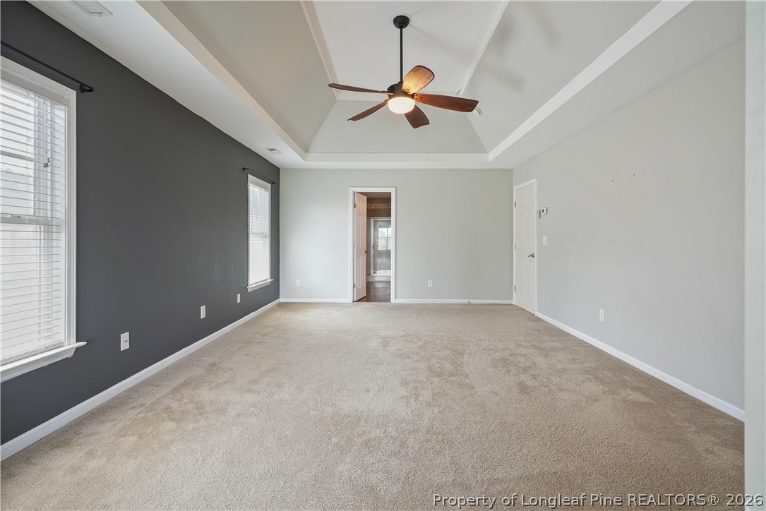 415 Highgrove Drive Spring Lake, NC 28390 - Photo 21 of 39 a view of a livingroom with a ceiling fan and window
