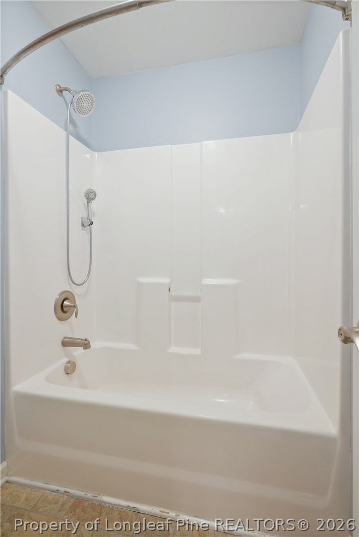 415 Highgrove Drive Spring Lake, NC 28390 - Photo 26 of 39 a bathroom with a bathtub