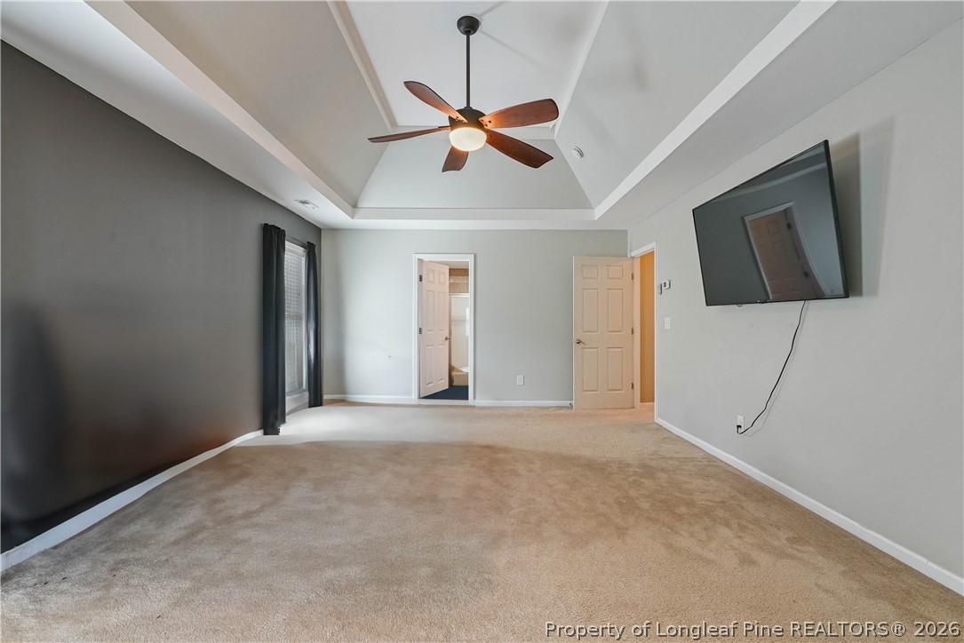 415 Highgrove Drive Spring Lake, NC 28390 - Photo 32 of 39 a view of a livingroom with a ceiling fan and window