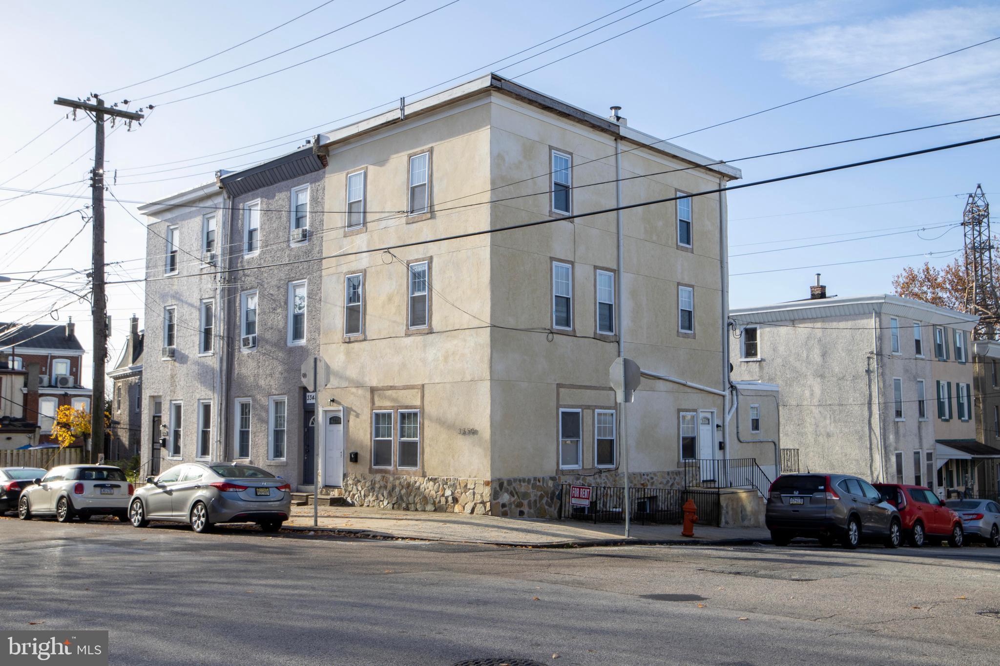 3350 Conrad Street, Unit A Philadelphia, PA 19129 - Photo 1 of 21 a city street lined with buildings and cars