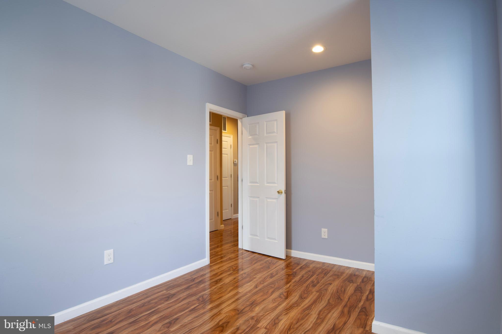 3350 Conrad Street, Unit A Philadelphia, PA 19129 - Photo 14 of 21 a view of an empty room with wooden floor and closet