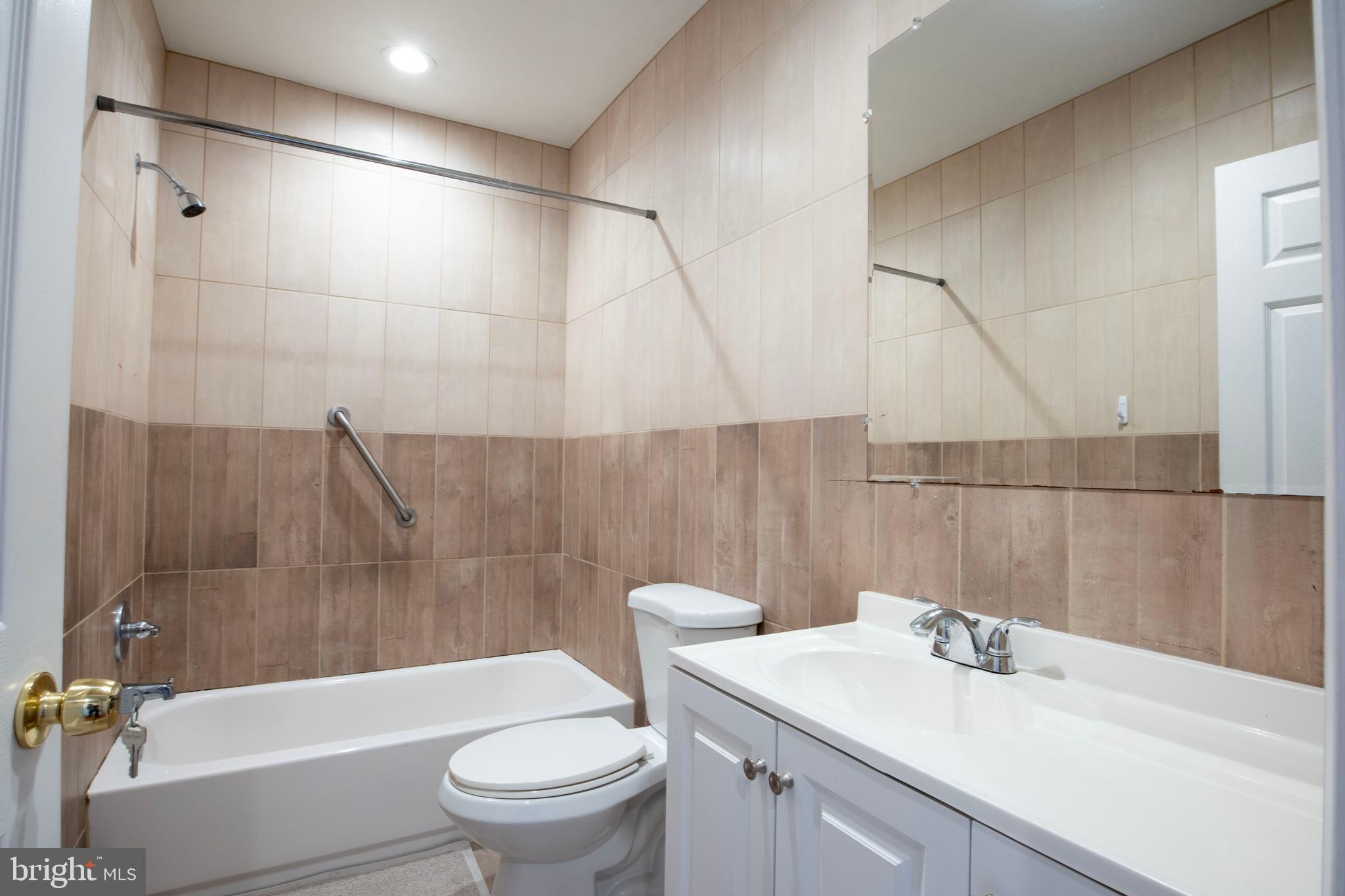 3350 Conrad Street, Unit A Philadelphia, PA 19129 - Photo 15 of 21 a bathroom with a sink a toilet and shower
