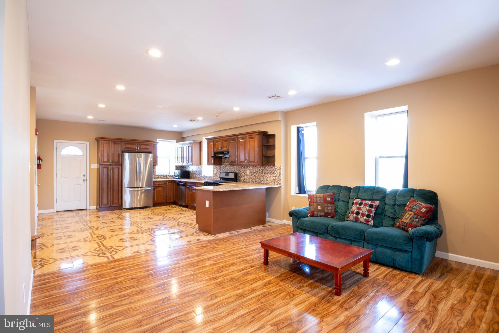 3350 Conrad Street, Unit A Philadelphia, PA 19129 - Photo 2 of 21 a living room with furniture and kitchen view