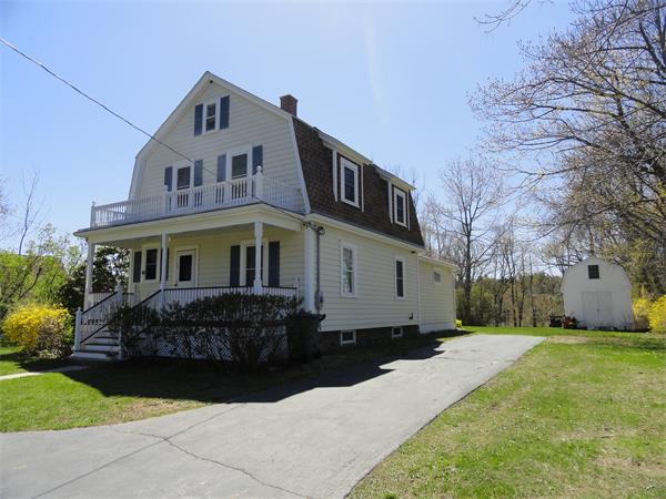 49 Glenwood Road Rutland, MA 01543 - Photo 1 of 21 a front view of a house with a yard