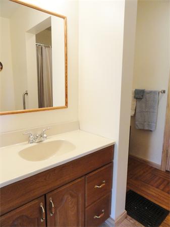 49 Glenwood Road Rutland, MA 01543 - Photo 11 of 21 a bathroom with a sink and a mirror