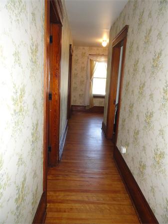 49 Glenwood Road Rutland, MA 01543 - Photo 15 of 21 a view of a hallway with wooden floor and staircase
