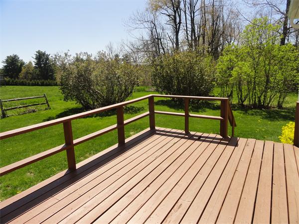 49 Glenwood Road Rutland, MA 01543 - Photo 20 of 21 a view of backyard with deck and wooden floor