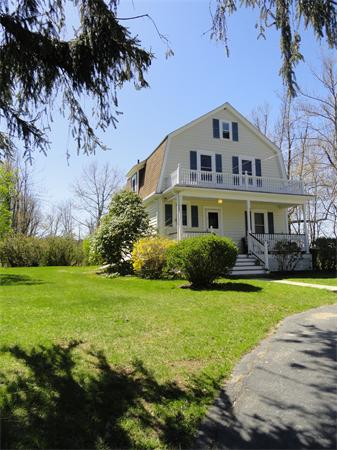 49 Glenwood Road Rutland, MA 01543 - Photo 21 of 21 a front view of a house with a yard