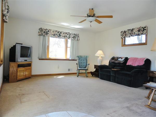 49 Glenwood Road Rutland, MA 01543 - Photo 3 of 21 a living room with furniture and a flat screen tv