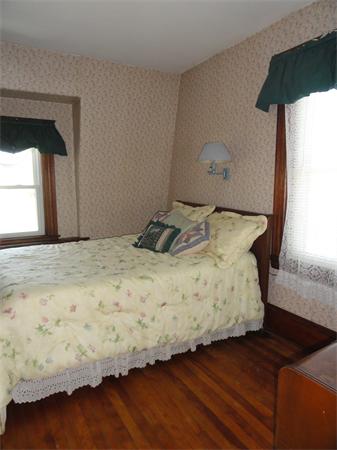 49 Glenwood Road Rutland, MA 01543 - Photo 8 of 21 a bedroom with a bed and window