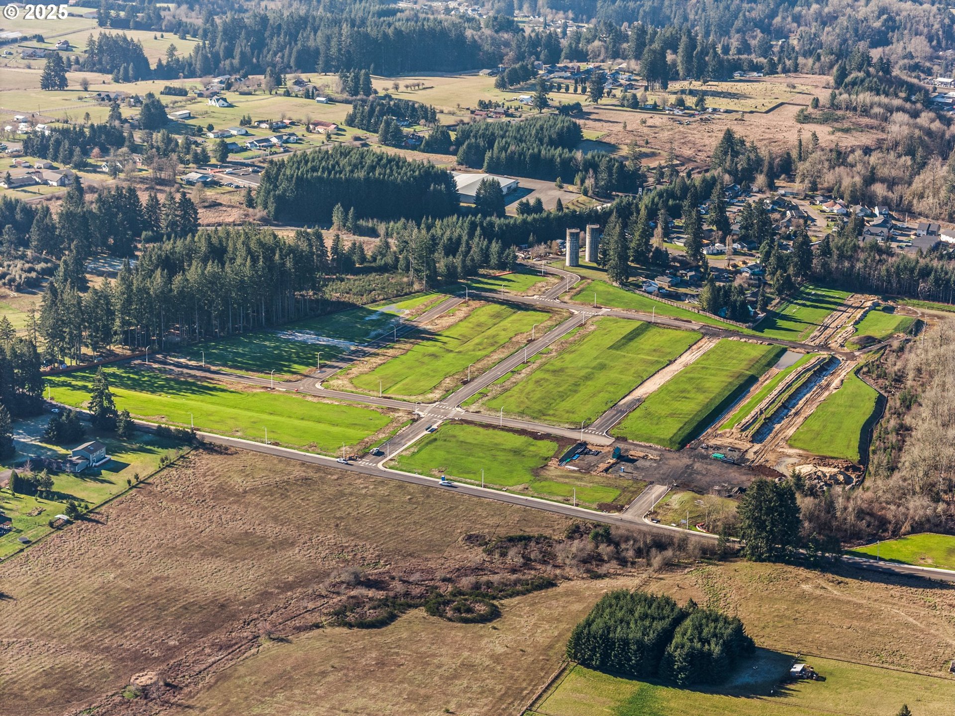 423 Kakela Road, Unit 8 Winlock, WA 98596 - Photo 11 of 35 an aerial view of a house with a swimming pool