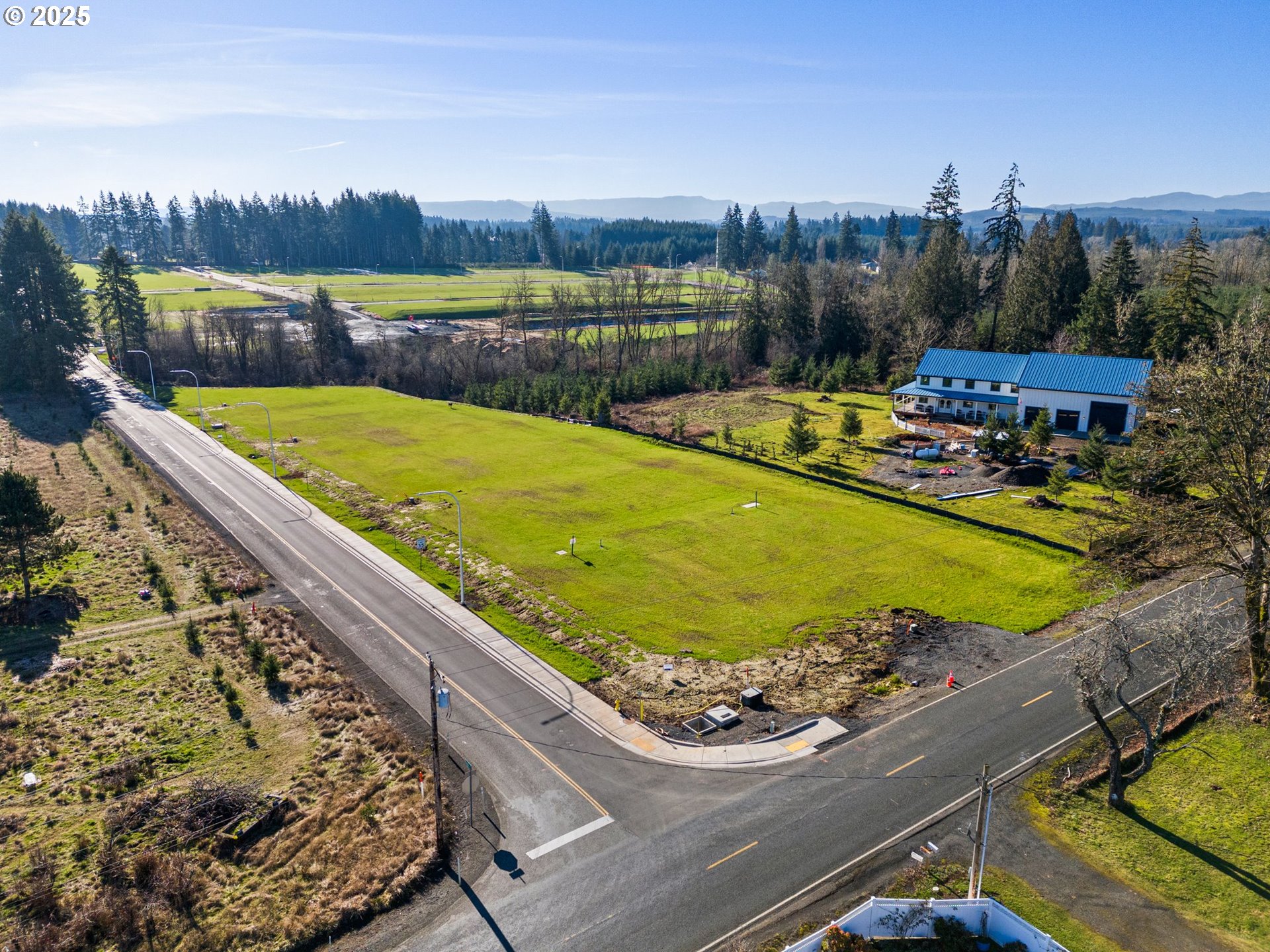 423 Kakela Road, Unit 8 Winlock, WA 98596 - Photo 16 of 35 a view of a swimming pool with a patio and a yard