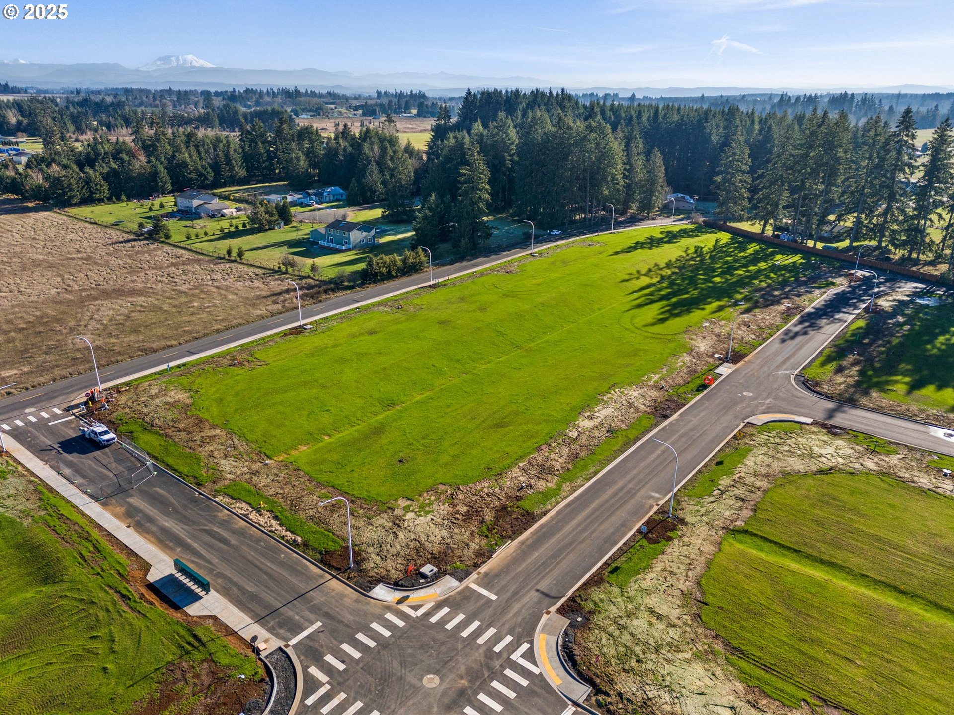 423 Kakela Road, Unit 8 Winlock, WA 98596 - Photo 30 of 35 a view of a swimming pool with a patio and a garden
