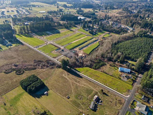 an aerial view of a pool a yard swimming pool and outdoor seating