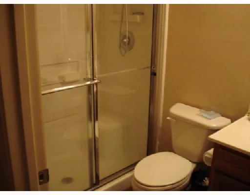 a bathroom with a sink and toilet