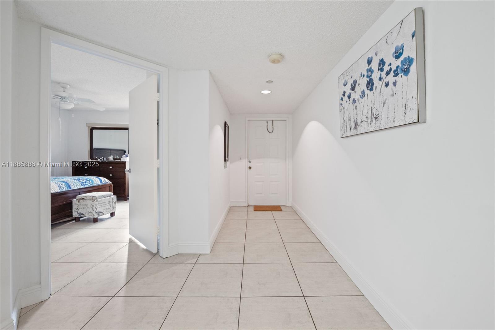 701 Southwest 142nd Avenue, Unit 110S Pembroke Pines, FL 33027 - Photo 4 of 25 a view of a hallway view with staircase
