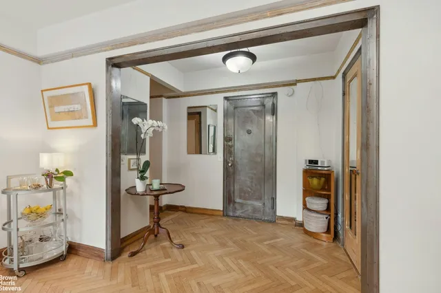 a view of room with furniture and closet