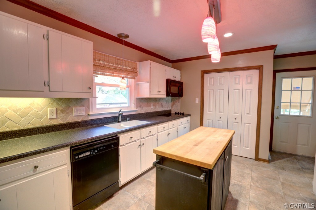 2220 Shallow Well Road Manakin-Sabot, VA 23103 - Photo 14 of 23 a kitchen with a sink dishwasher a stove a refrigerator and cabinets