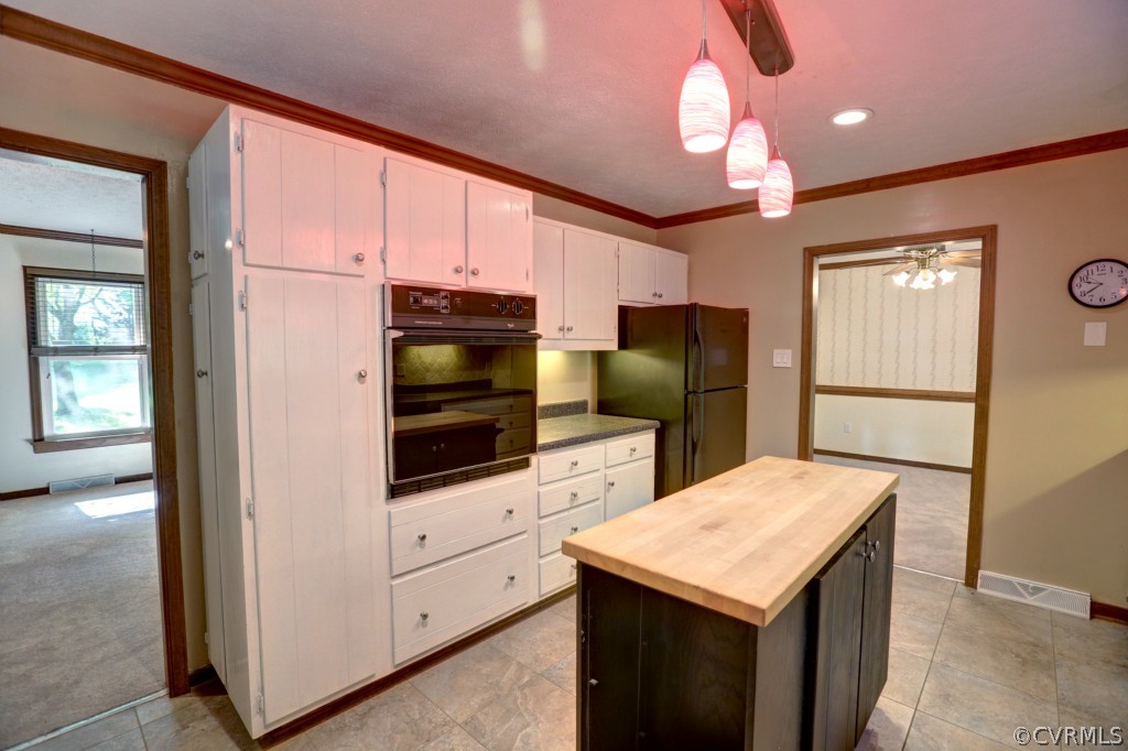2220 Shallow Well Road Manakin-Sabot, VA 23103 - Photo 15 of 23 a kitchen with a refrigerator a stove top oven a sink and dishwasher