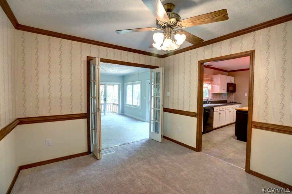 2220 Shallow Well Road Manakin-Sabot, VA 23103 - Photo 23 of 23 a view of a hallway with kitchen and chandelier
