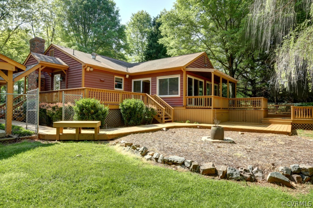 2220 Shallow Well Road Manakin-Sabot, VA 23103 - Photo 8 of 23 a front view of a house with a garden