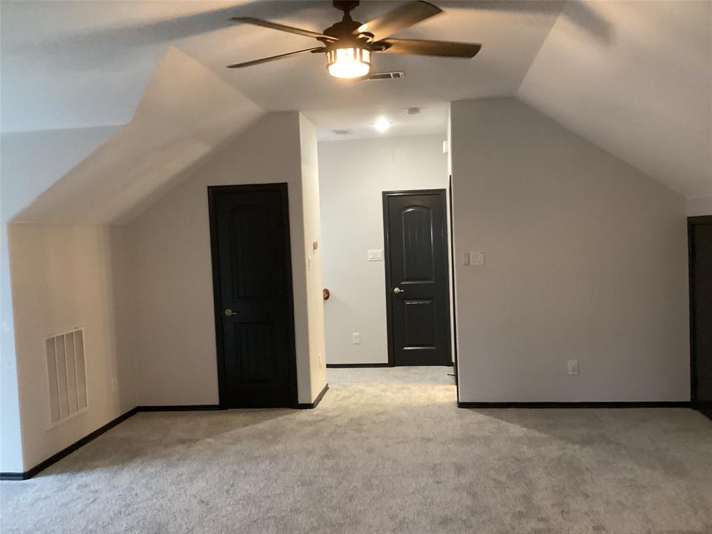 10320 Point Lobos Trail Fort Worth, TX 76177 - Photo 24 of 33 Spacious carpeted room featuring a ceiling fan with integrated lighting, recessed lighting, and multiple black paneled doors