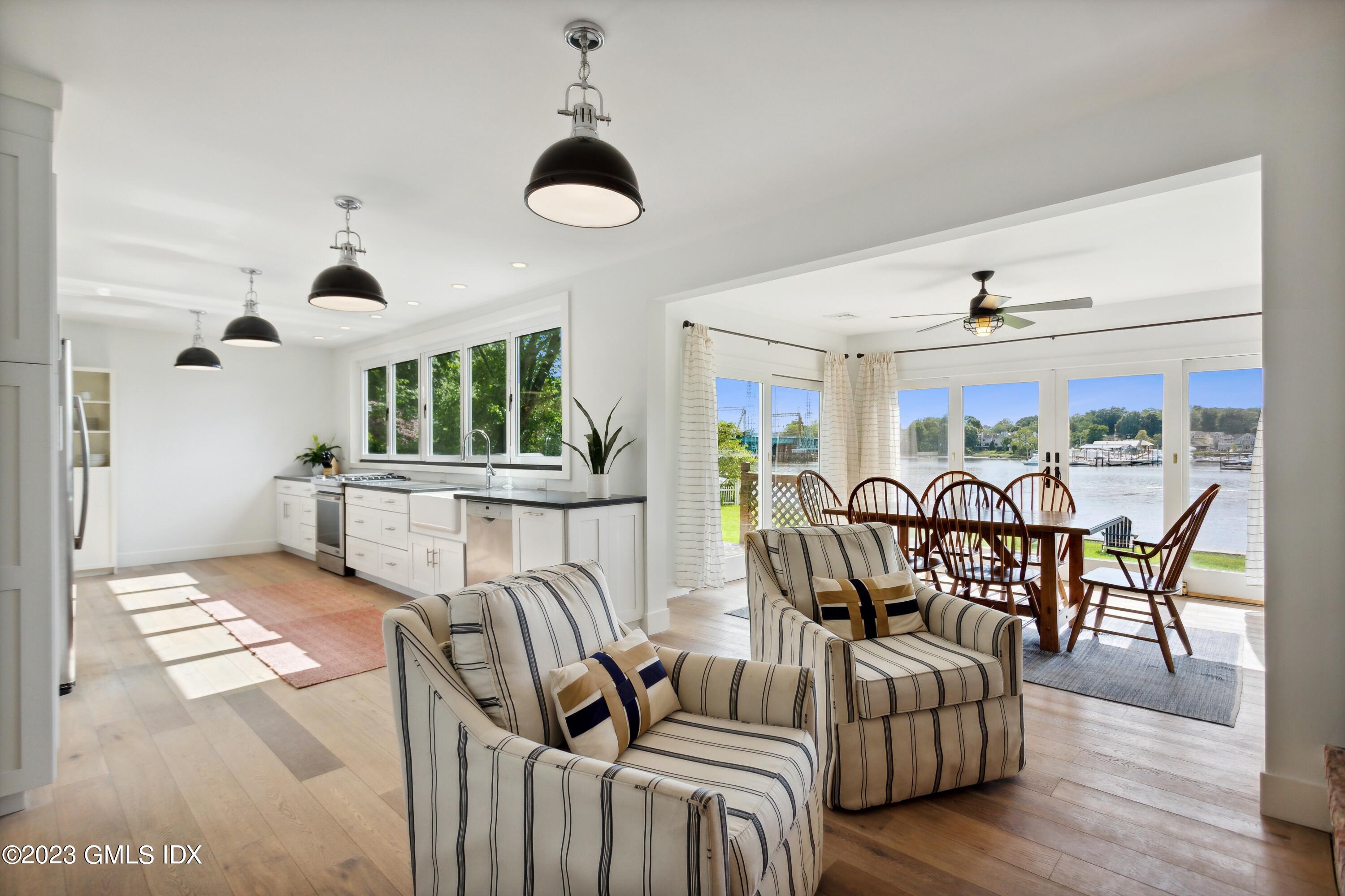 40 Chapel Lane Riverside, CT 06878 - Photo 13 of 35 a view of a livingroom with furniture window and wooden floor