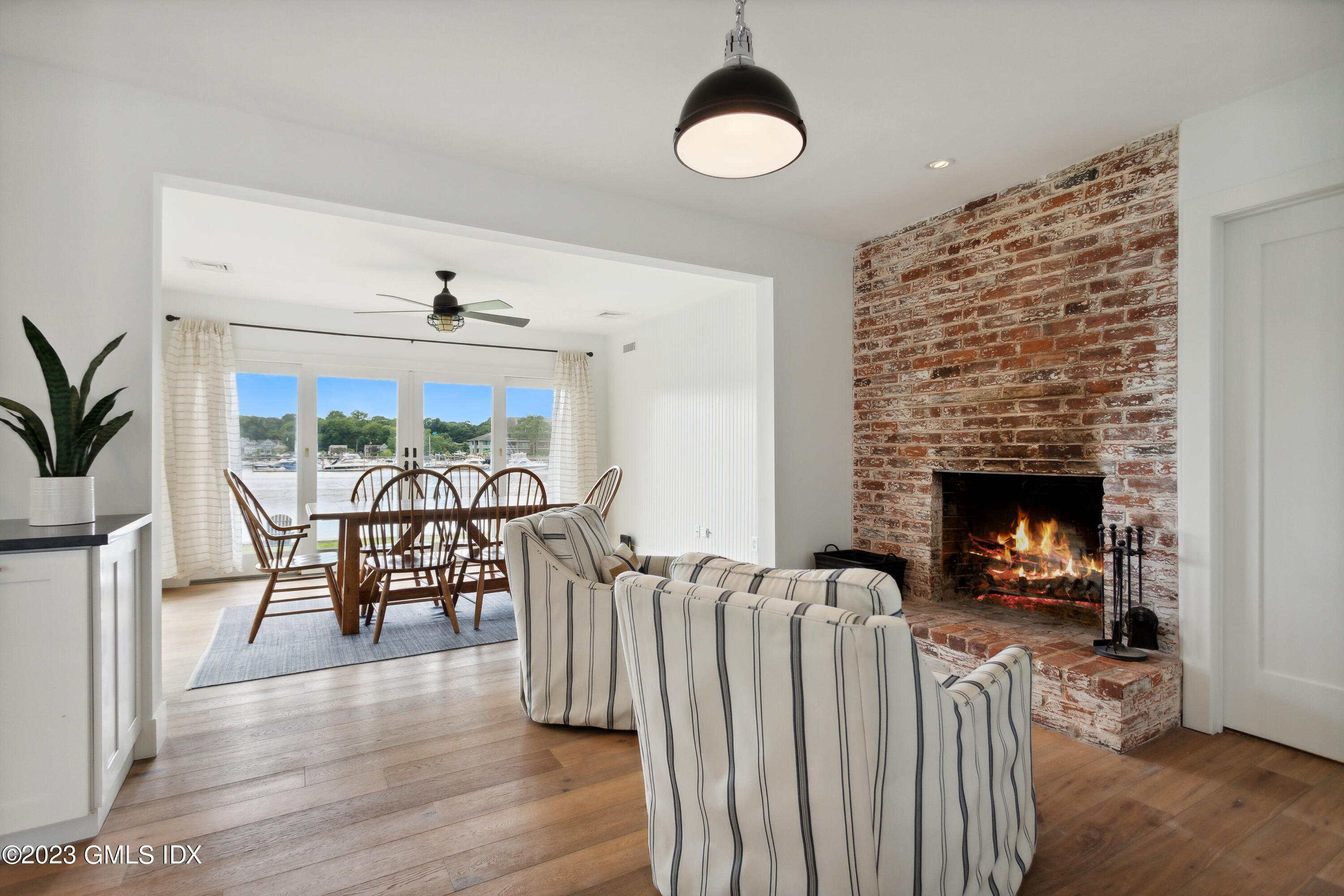 40 Chapel Lane Riverside, CT 06878 - Photo 15 of 35 a view of a livingroom with furniture and a fireplace