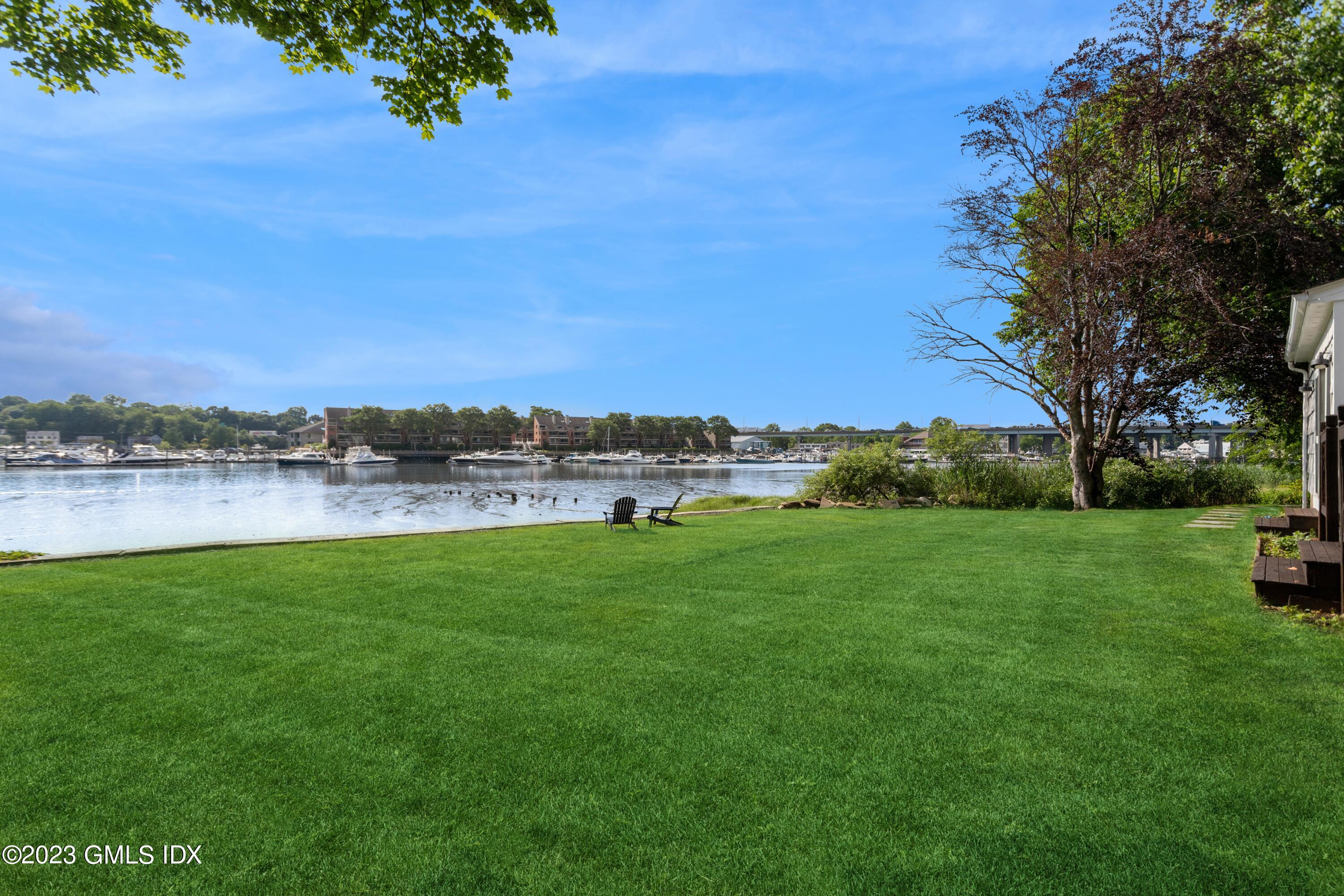 40 Chapel Lane Riverside, CT 06878 - Photo 32 of 35 a view of a lake with houses