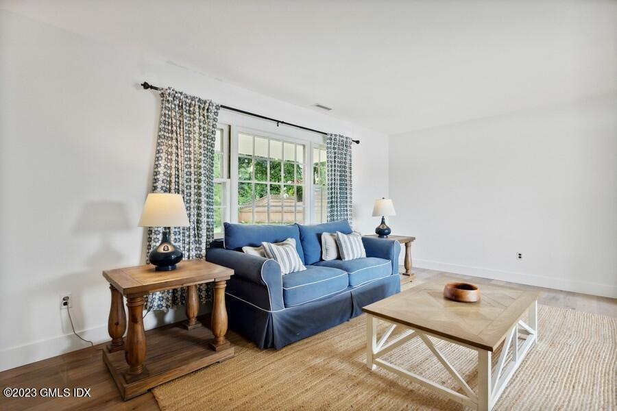 40 Chapel Lane Riverside, CT 06878 - Photo 7 of 35 a living room with furniture and a window