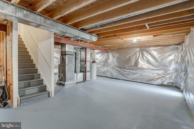a view of an empty room with stairs