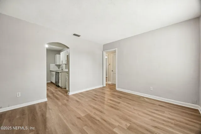 an empty room with windows