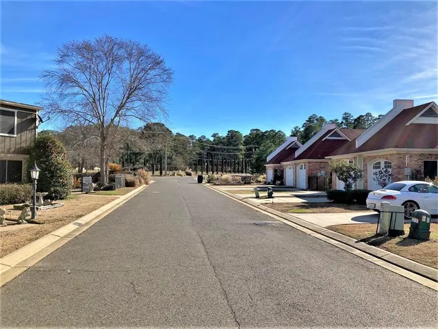 a view of a street with houses