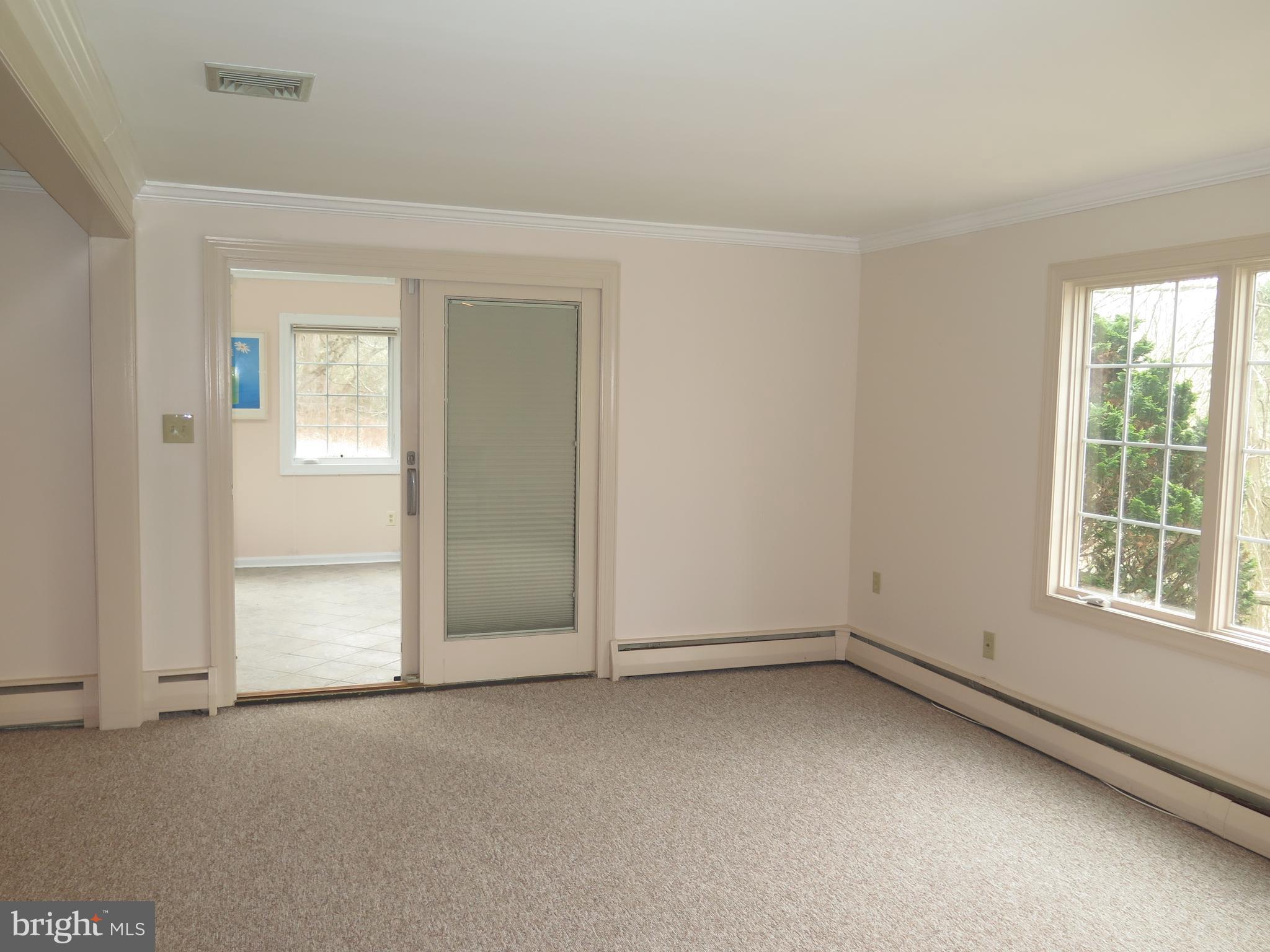 376 Mt Alverno Road Media, PA 19063 - Photo 12 of 50 Family Room - Door Leads To Sun Room