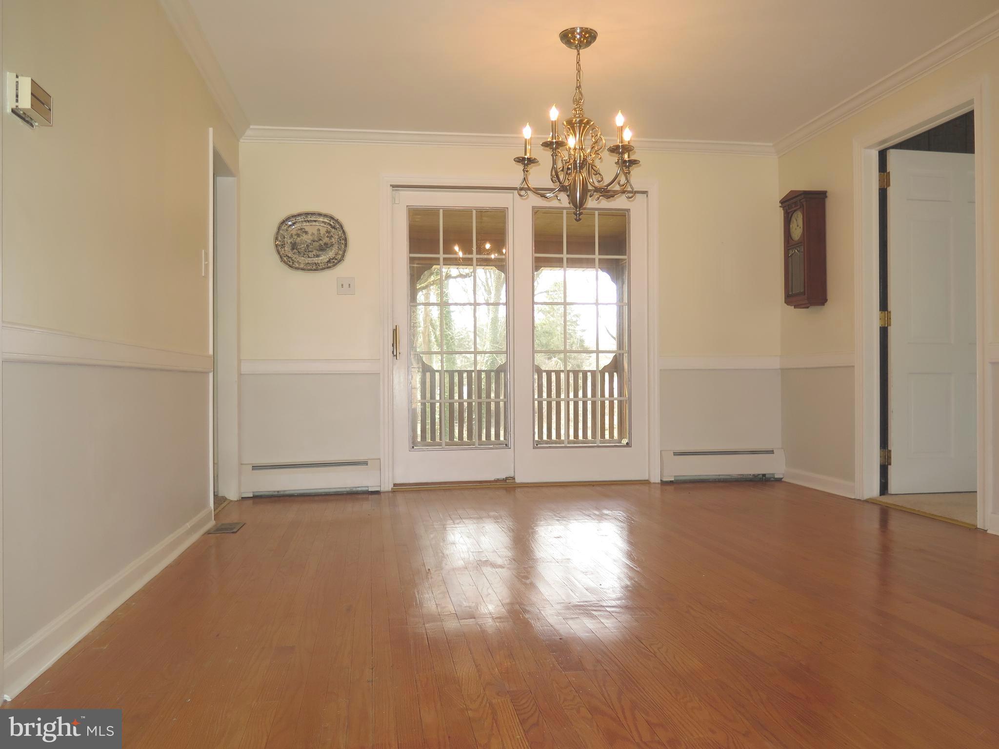 376 Mt Alverno Road Media, PA 19063 - Photo 21 of 50 Dining Room With Sliding Door To Screened Porch
