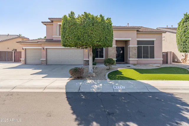 a view of a house with swimming pool