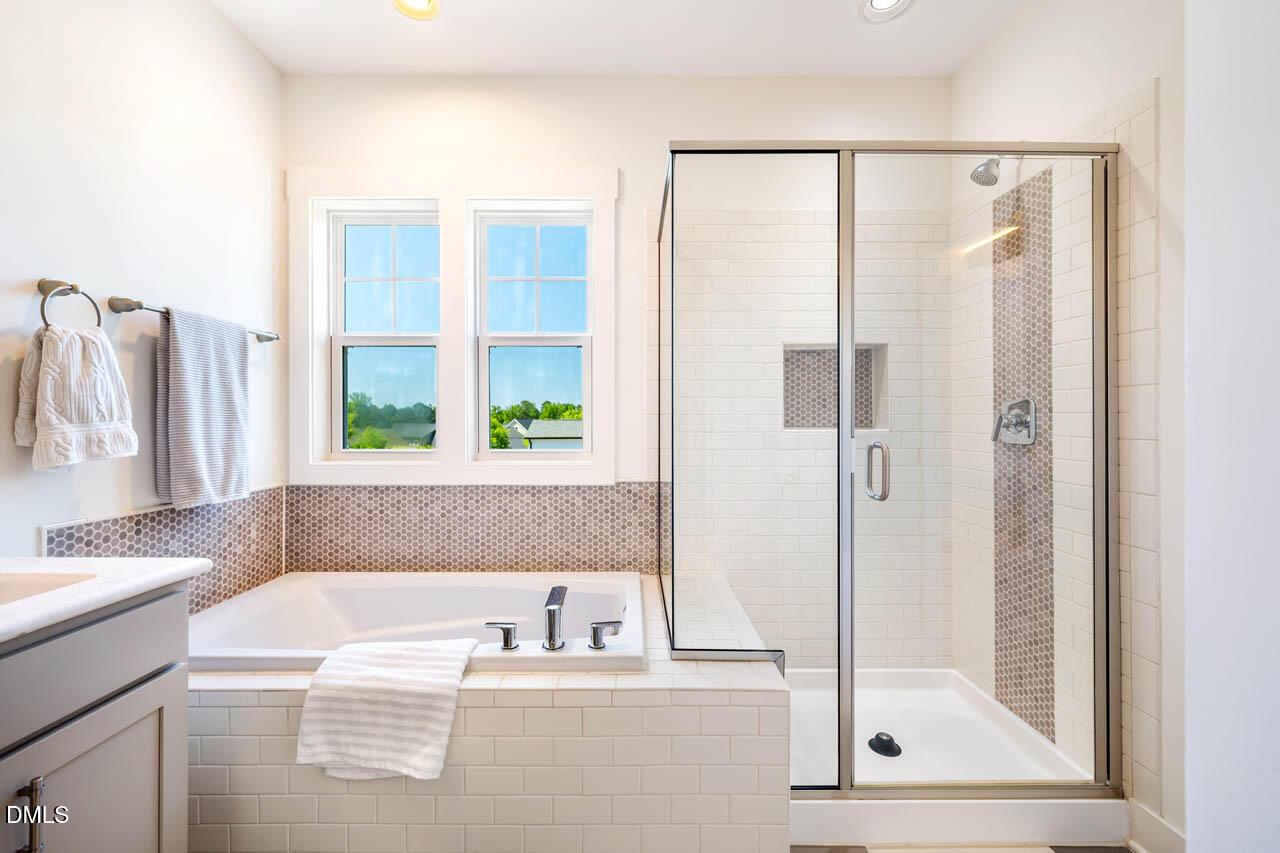 20 Cardinal Ridge Road Chapel Hill, NC 27516 - Photo 32 of 77 Soaking Tub & Tiled Shower