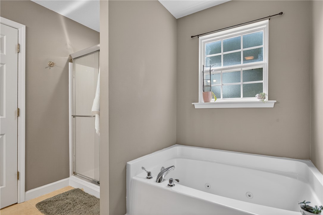151 Towne Creek Trail Anderson, SC 29621 - Photo 19 of 49 Relax in the deep soaking tub, complemented by a private shower and a naturally illuminated window.
